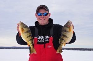 Jake Romanack with his perch caught on Lake Gogebic
